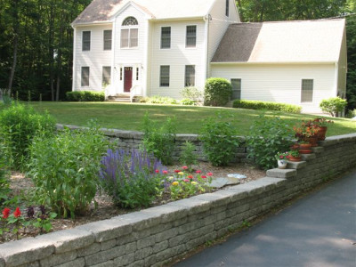 New Retaining Wall with flowers planted on top